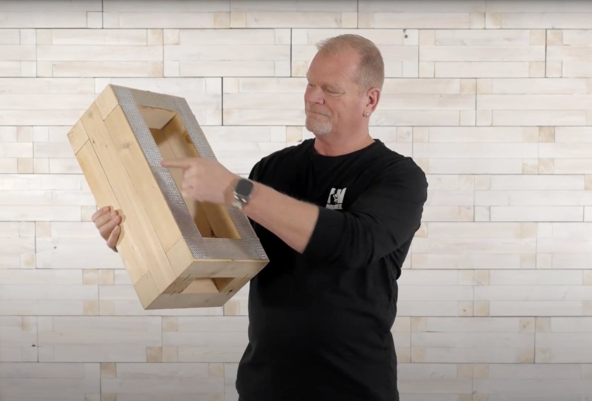 Mike Holmes with EZblocks block. Holmes Approved Product