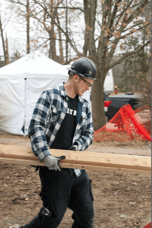 Stigma In The Skilled Trades - Mike Holmes Jr Carrying Wood