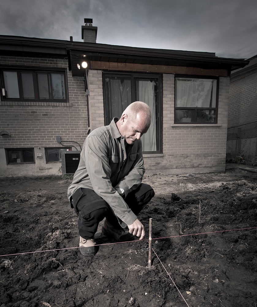 Mike Holmes is testing radon on the ground
