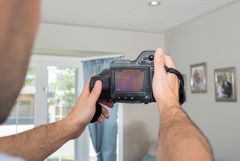 Mike Holmes Inspector Using a Thermal Imaging Camera