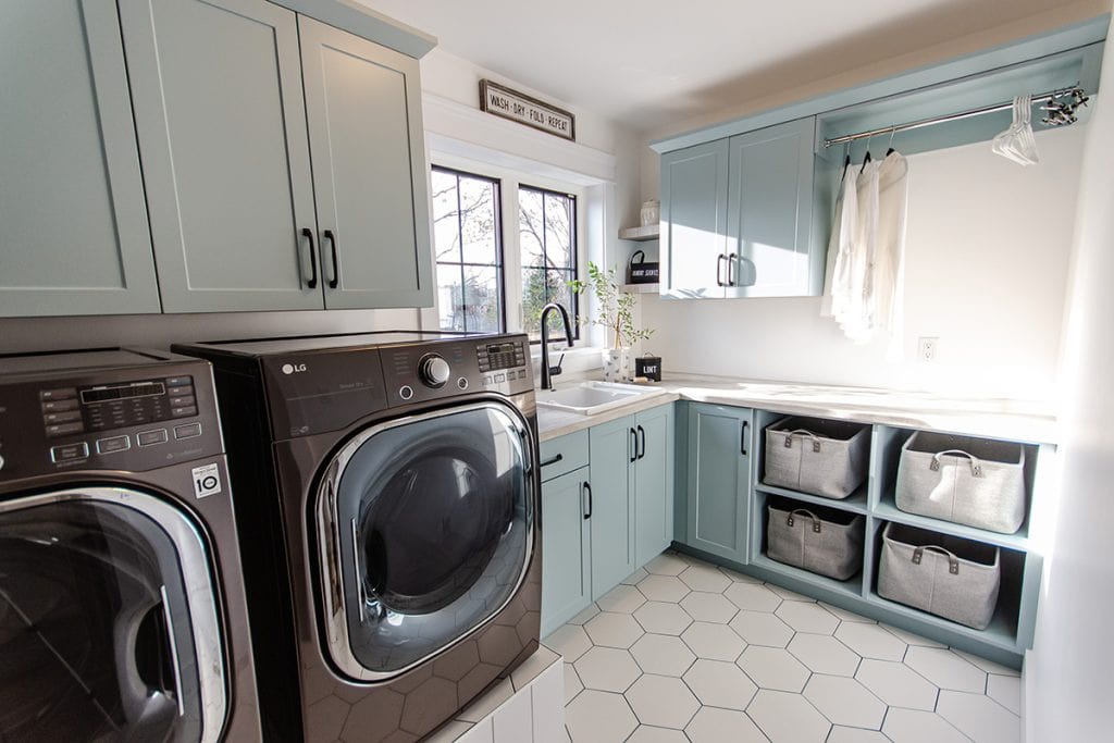 Main floor laundry room by Chris Franklin Homes, Holmes Approved Homes Builder