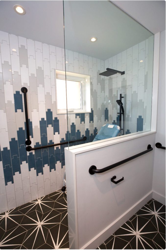 Have a little fun with your floor tile. Check out the black and white starburst tiled floor from Noah's Bathroom, Episode 4 Holmes Family Rescue