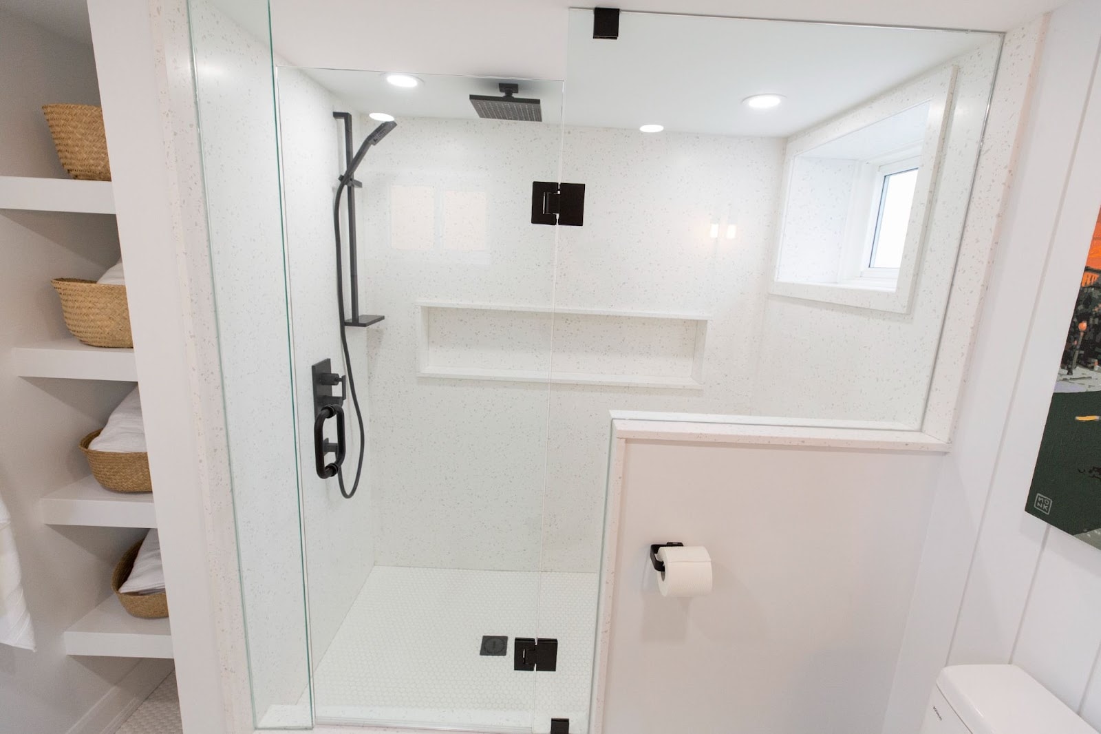 A long horizontal shower niche was installed on one of our projects for Holmes Family Rescue