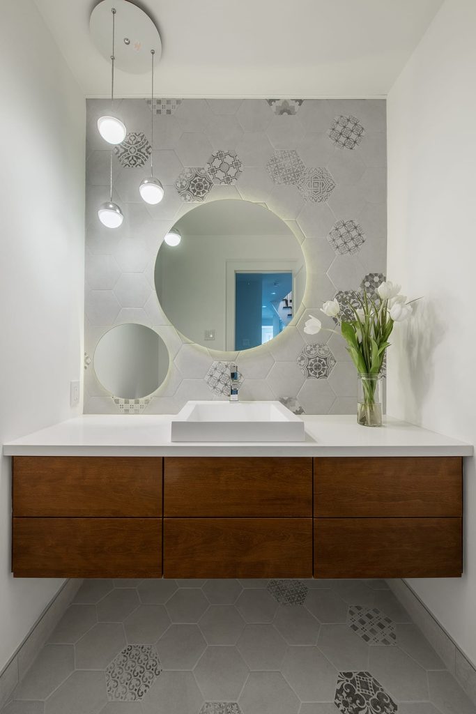 This floating vanity creates the illusion of more space by Sosna, a Holmes Approved Renovator.