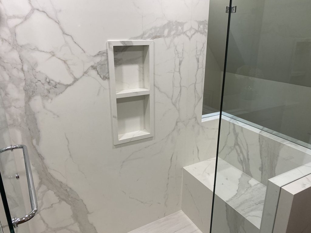 Porcelain slabs look amazing and with no grout lines, though expert installation is required to achieve a continuous pattern.