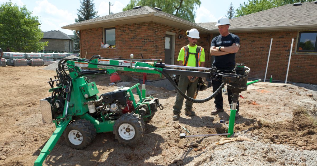 Mike Holmes Installing Techno Metal Posts on one of our projects. Photo from Holmes Family Rescue.