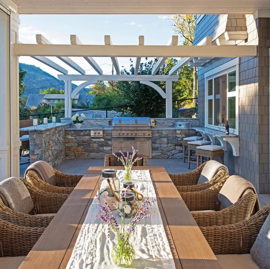 Outdoor Dining Area and Kitchen. Renovation by Frame Custom Homes, Holmes Approved Homes Builder.