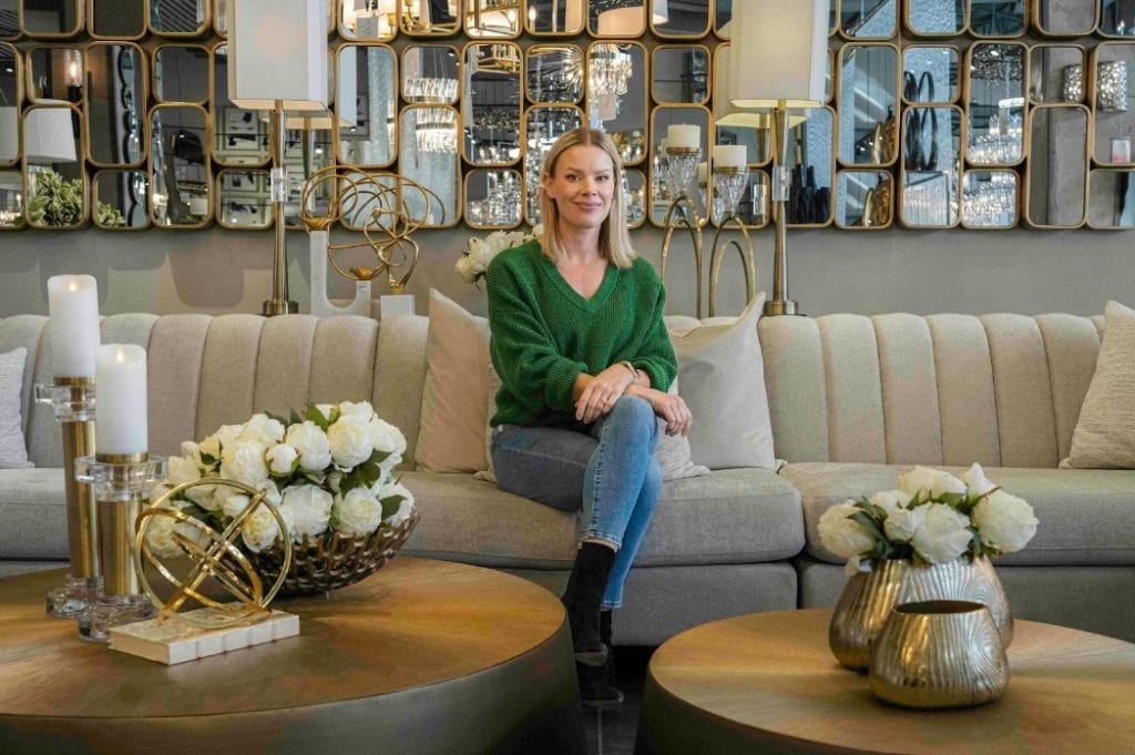 Sherry Holmes in a beautiful designed living room