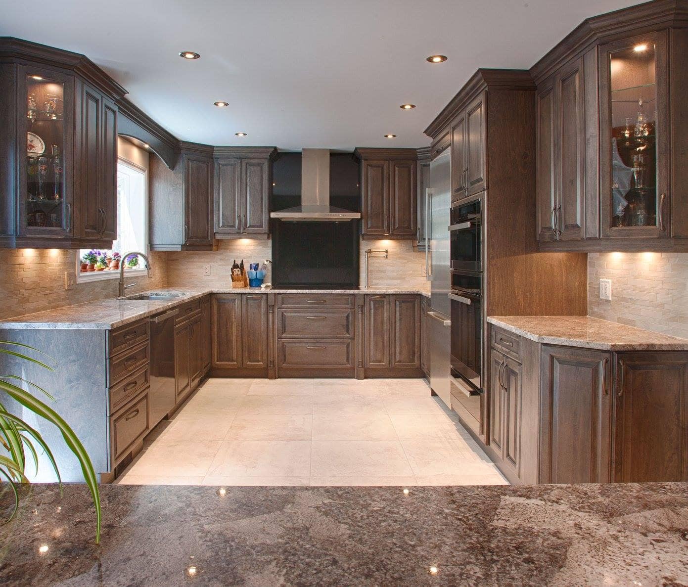 U-shaped kitchen layout. Custom cabinets from Milmonde Kitchens, Holmes Approved Product.