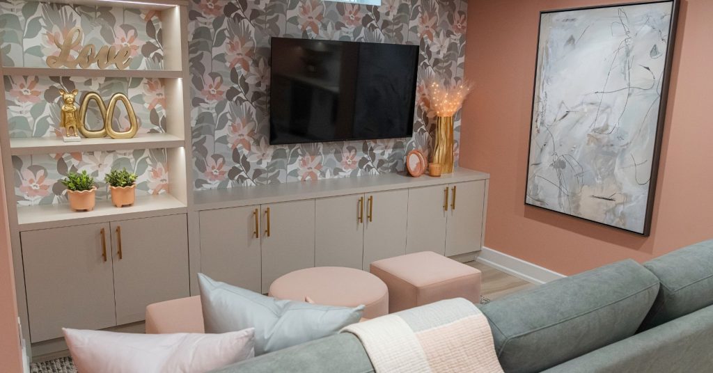 Wallpaper Ideas From Mike Holmes Projects. Floral wallpaper to complement pink walls in this feminine basement.