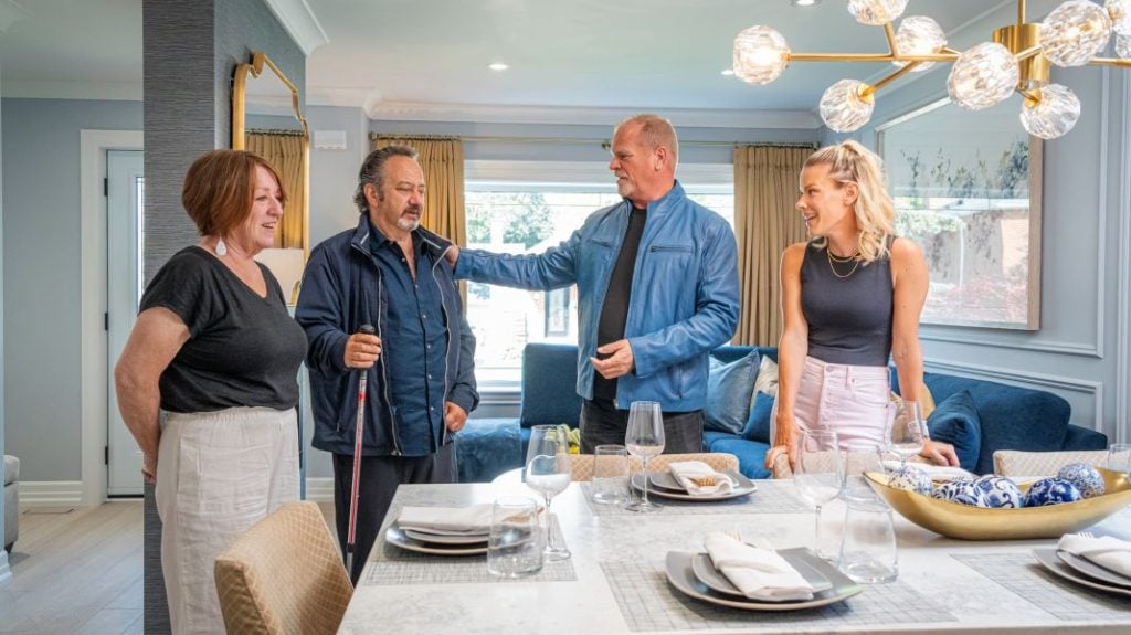 Holmes Family Rescue Reno: Restoring Comfort & Function to John & Lesa’s Home. John and Lesa with Mike and Sherry during the reveal.