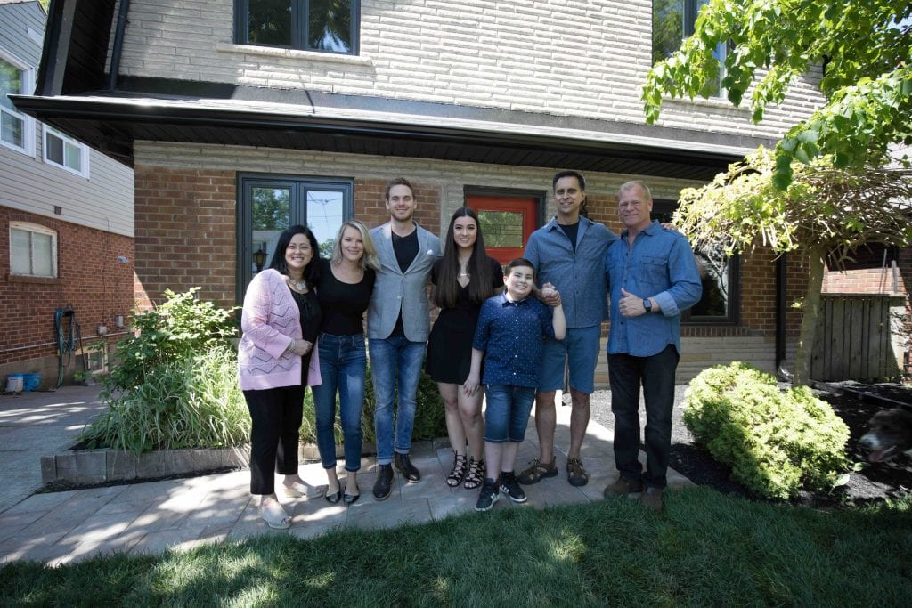 Mike Holmes and his children, Sherry and Michael, with Jake and his family on Holmes and Holmes City Barn project